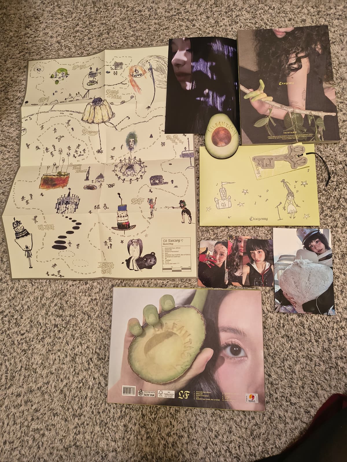 a spread of posters and pictures that came with the album Lil Fantasy Vol 3